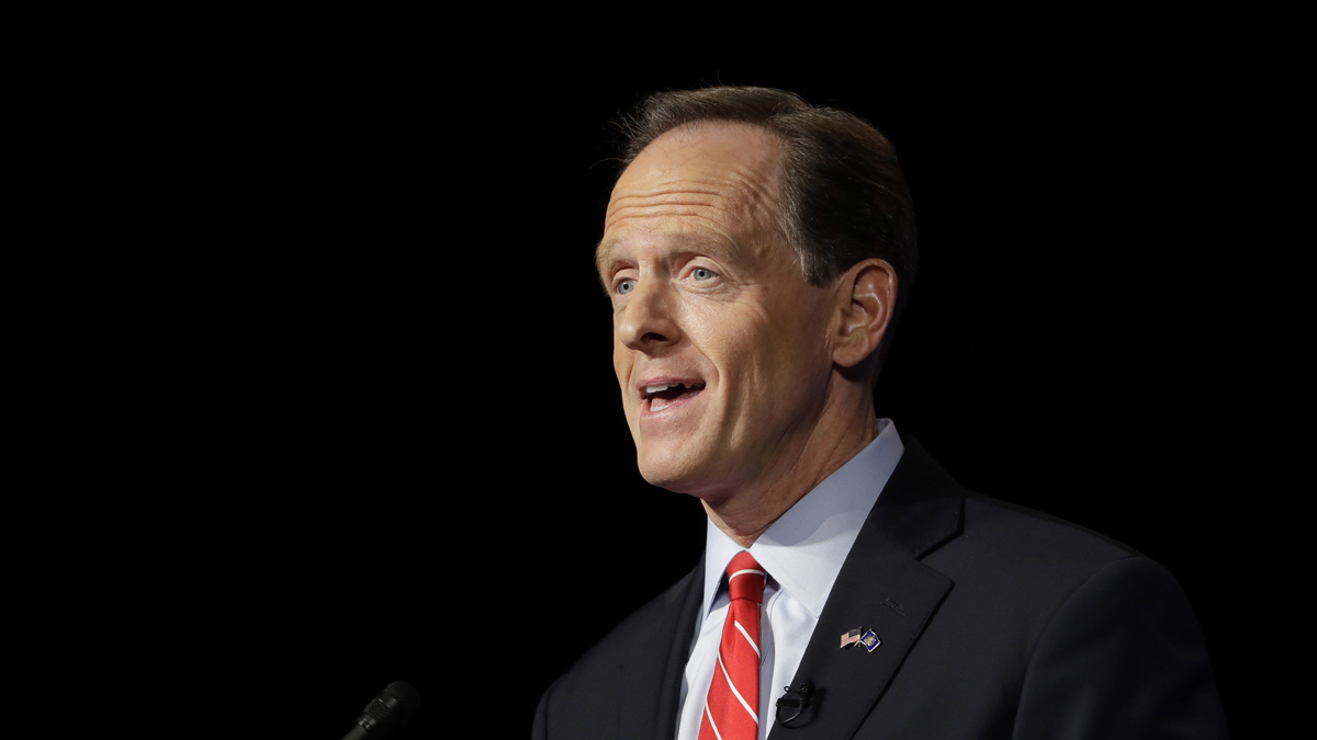 Republican U.S. Sen. Pat Toomey is shown debating against his Democratic challenger Katie McGinty in October at Temple University in Philadelphia. (AP Photo/Matt Rourke