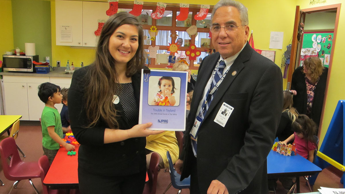  Gayle Schwartzberg with NJPIRG and Ron Regan with the New Jersey Division of Consumer Affairs talk about toy safety hazards at a news conference at the Justice Juniors Child Care Center in Trenton. (Phil Gregory/WHYY) 