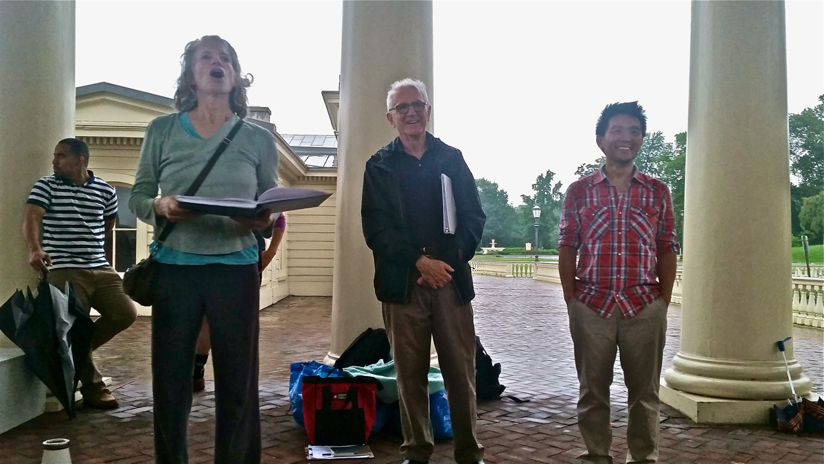  Mendelssohn Club Musical Director Alan Harler (center) attends rehearsal for his final production, TURBINE, at the Philadelphia Waterworks. He is joined by choreographer Leah Stein and composer Byron Au Yong. (Peter Crimmins/WHYY) 