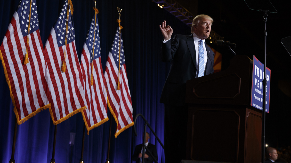 Republican presidential candidate Donald Trump delivers an immigration policy speech during a campaign rally in Phoenix on Wednesday
