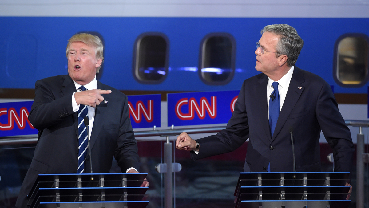  Republican presidential candidate Donald Trump, left, and former Florida Gov. Jeb Bush talk over each other during the CNN Republican presidential debate at the Ronald Reagan Presidential Library and Museum, Wednesday, Sept. 16, 2015, in Simi Valley, Calif. (AP Photo/Mark J. Terrill) 