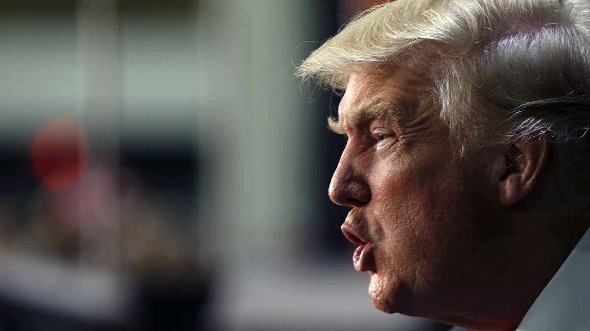 Republican presidential candidate Donald Trump responds to the crowd after delivering a campaign speech in Charlotte