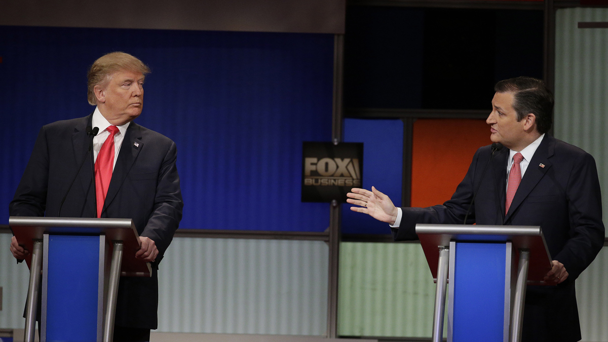  Republican presidential candidate, businessman Donald Trump and Republican presidential candidate, Sen. Ted Cruz, R-Texas, are shown in an exchange during a Republican presidential debate on Thursday, Jan. 14, 2016, in North Charleston, S.C. (AP Photo/Chuck Burton) 
