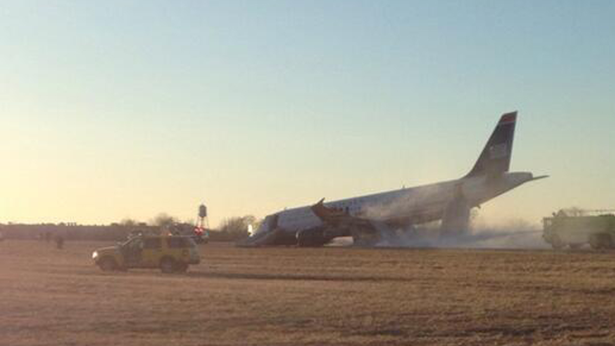  A picture of US Airways Flight 1702 taken by passenger Hannah Udren just moments after an emergency evacuation in Philadelphia on Thursday, Mar. 13, 2014 (Image courtesy of Udren via Twitter @han_horan) 