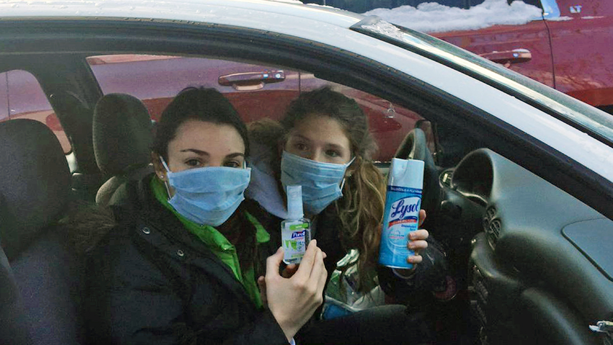  Ursinus College students wear  surgical masks and carry antibacterial products. Nearly 200 students have been sickened at the school about 30 miles from Philadelphia.(Brian Neff) 