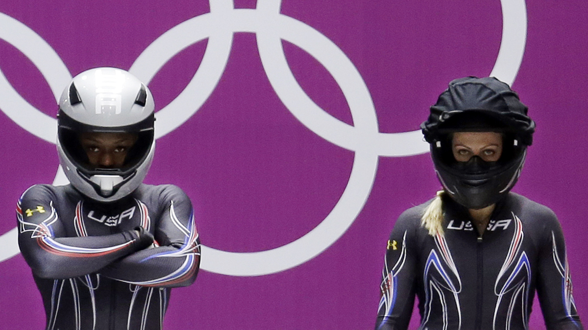  The team from the United States USA-2, piloted by Jamie Greubel with brakeman Aja Evans, prepare to start their third run during the women's bobsled competition at the 2014 Winter Olympics, Wednesday, Feb. 19, 2014, in Krasnaya Polyana, Russia. (Natacha Pisarenko/AP Photo) 