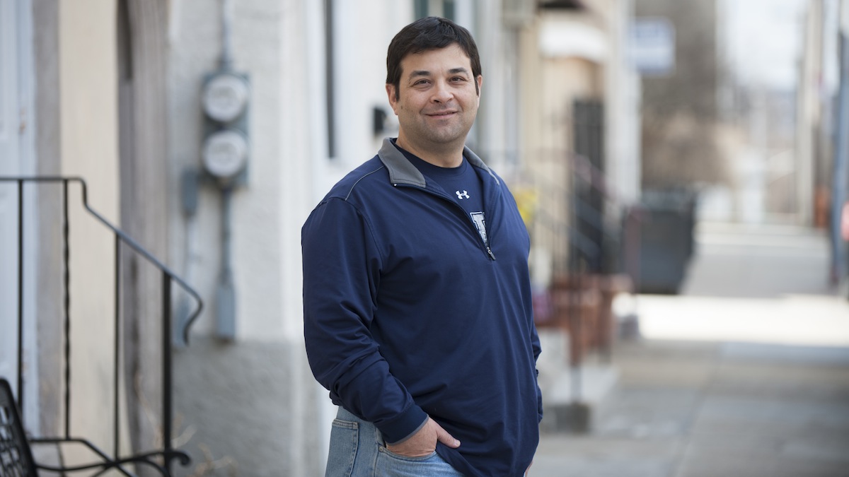  Steve Passio stands on Ridge Avenue in Roxborough. (Tracie Van Auken/for NewsWorks) 