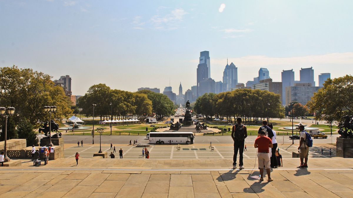The view of the Benjamin Franklin Parkway from the top of the Philadelphia Museum of Art.  (Kimberly Paynter/WHYY) 
