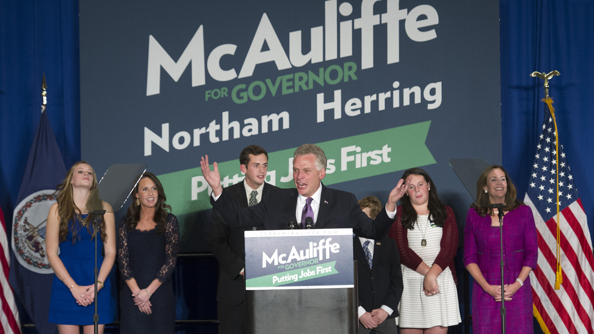  Democratic Virginia Gov.-elect Terry McAuliffe celebrates his election victory with his family during a party in Tysons Corner, Va., Tuesday, Nov. 5, 2013. (AP Photo/Cliff Owen) 