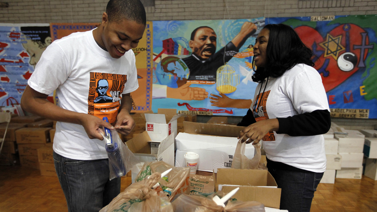  Volunteers Malcolm Kenyatta and Kylie Patterson assemble home weatherization kits during the Greater Philadelphia Martin Luther King Day of Service, at Girard College. (AP File Photo/Matt Rourke) 