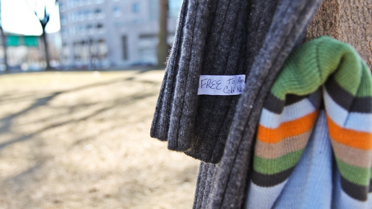 Winter clothing is strung up around Franklin Square Park for anyone going without in Philadelphia. (Kimberly Paynter/WHYY)