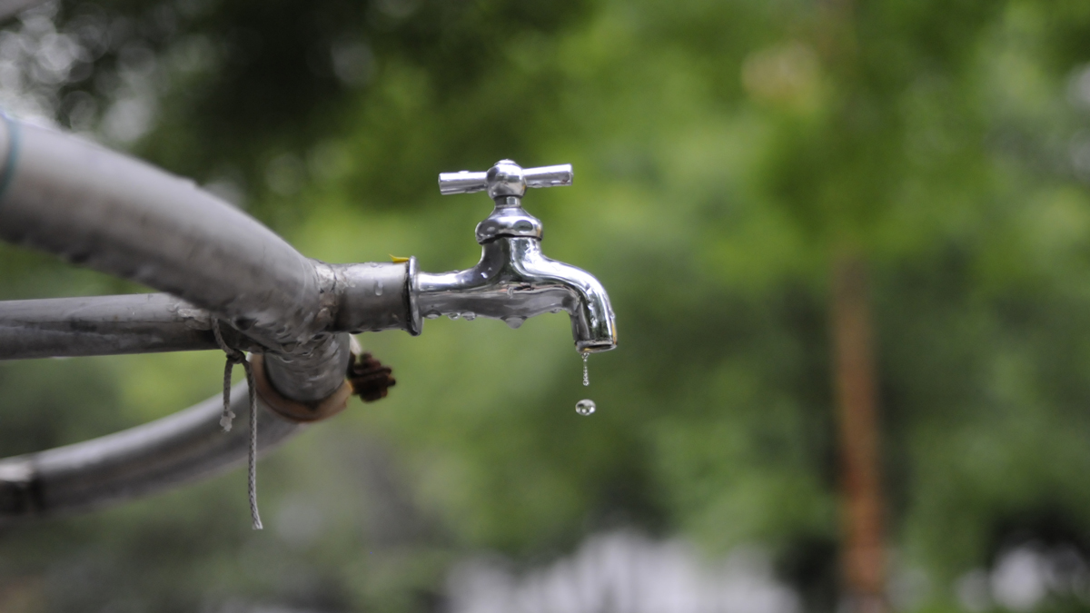 Water drips from a faucet. (File image by nekidtroll via <a href=