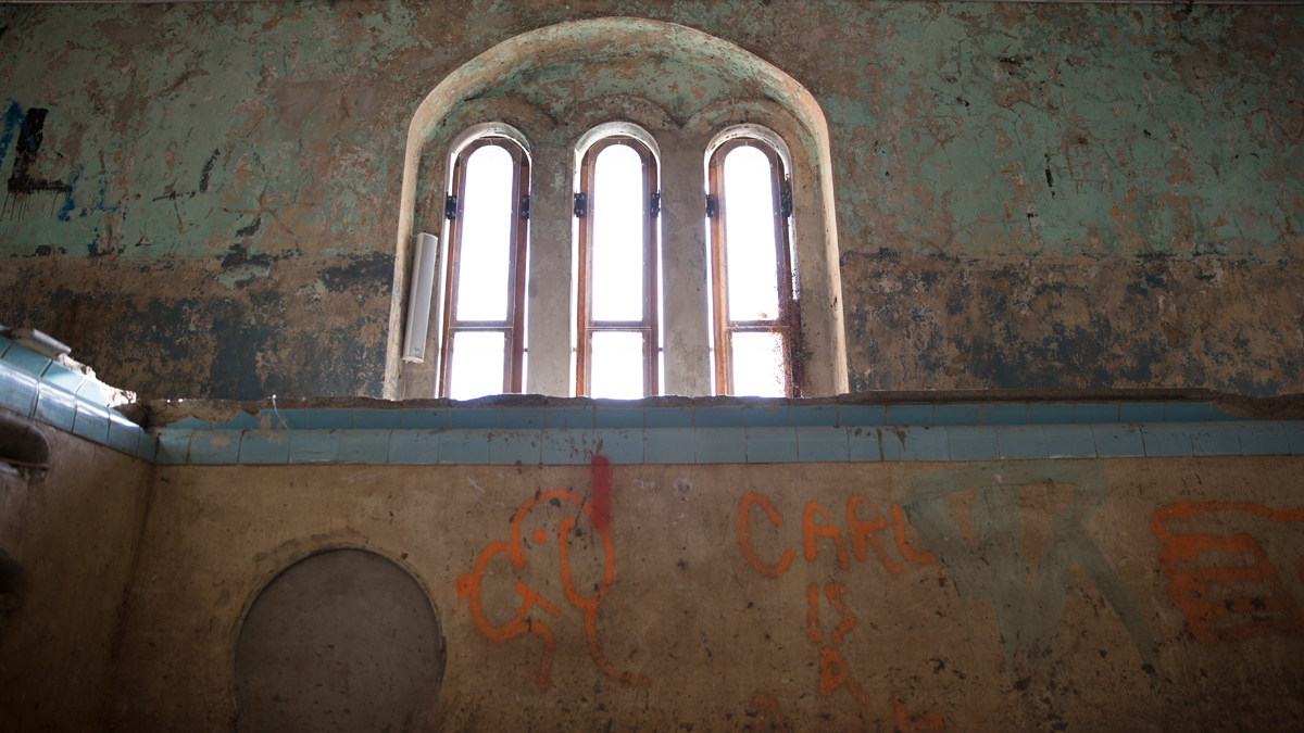  For one night only, Will Blair along with brother Brooke and Craig Hendrix of the Agave Opera Company present TRIBUTARIES: A Modern Cantana at the abandoned pool of Fairmount Water Works Interpretive Center.  (Lindsay Lazarski/WHYY) 
