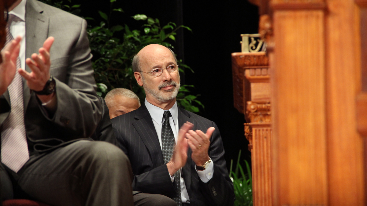  Gov. Tom Wolf applauds during inaugural ceremonies Monday for Philadelphia Mayor Jim Kenney. (Emma Lee/NewsWorks) 
