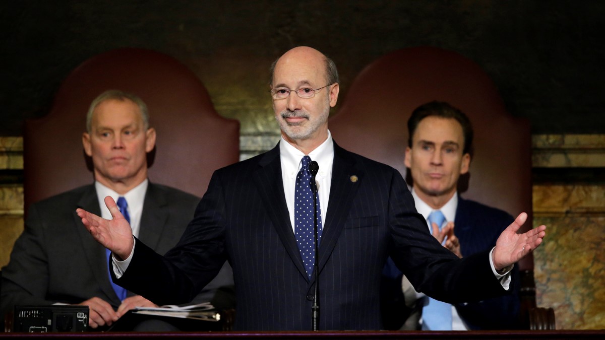  Gov. Tom Wolf delivers his budget address for the 2015-16 fiscal year to a joint session of the Pennsylvania House and Senate Tuesday in Harrisburg. Behind him are the Speaker of the House of Representatives Mike Turzai, R-Allegheny, left, and Lt. Gov. Michael Stack, is at right. (Matt Rourke/AP Photo)  