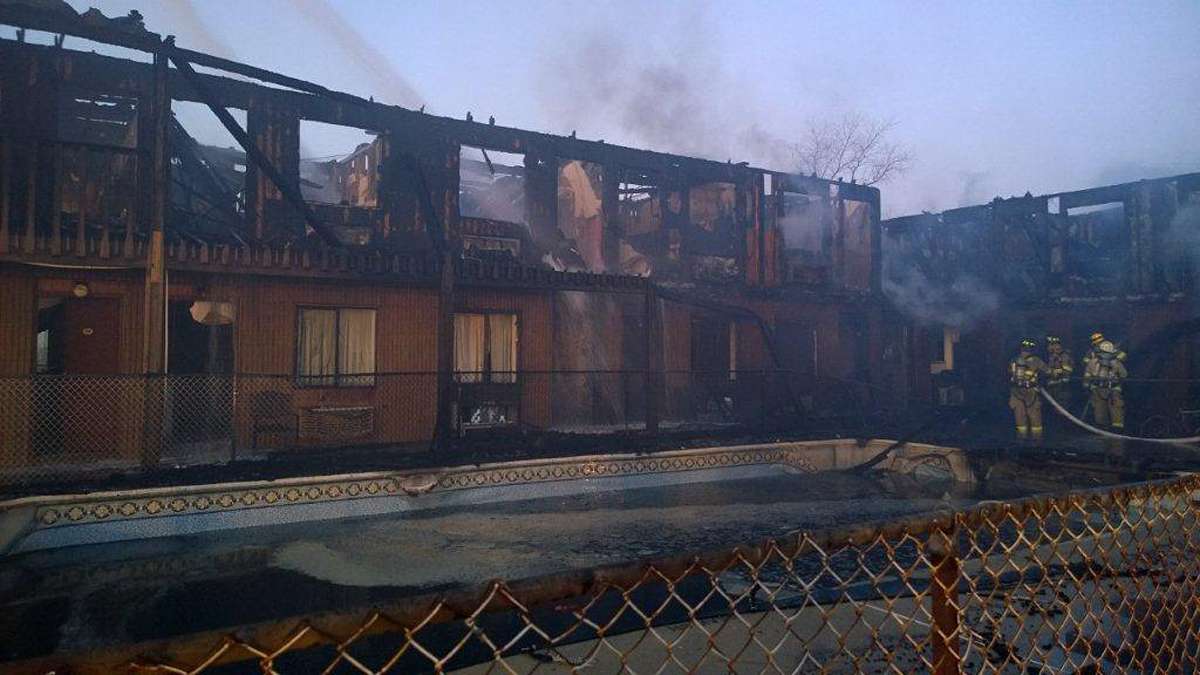  Smoke rises from the Mariner's Cove Inn Friday morning (AP Photo/Ocean County Prosecutors Office) 