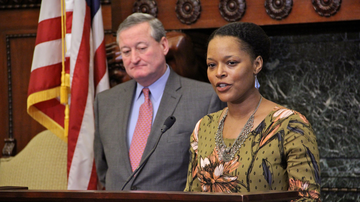  Philadelphia's new Poet Laureate Yolanda Wisher reads a poem in the Mayor's Reception Room at City Hall. (Emma Lee/WHYY) 
