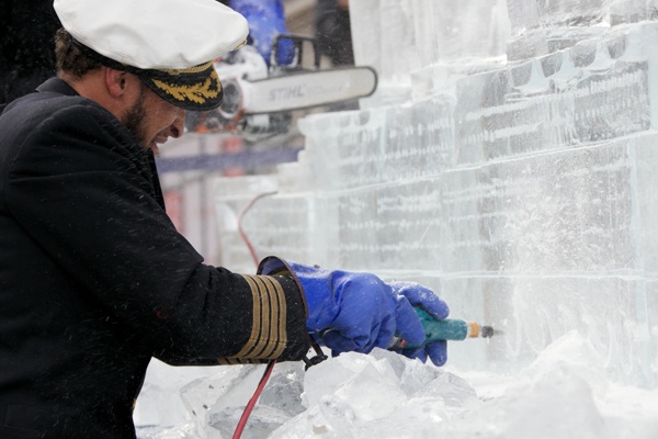 <p><p>Rob Capone and Don Harrison apply the finishing touches to the ship. (Nathaniel Hamilton/for NewsWorks)</p></p>
