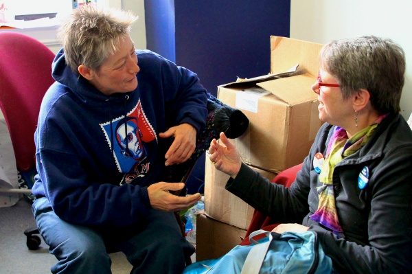 <p>At the Obama campaign office in Mt. Airy, Jonna Naylor talks with another volunteer who has offered her driving services to help get folks to the polls.  ( Jana Shea /for NewsWorks )</p>

