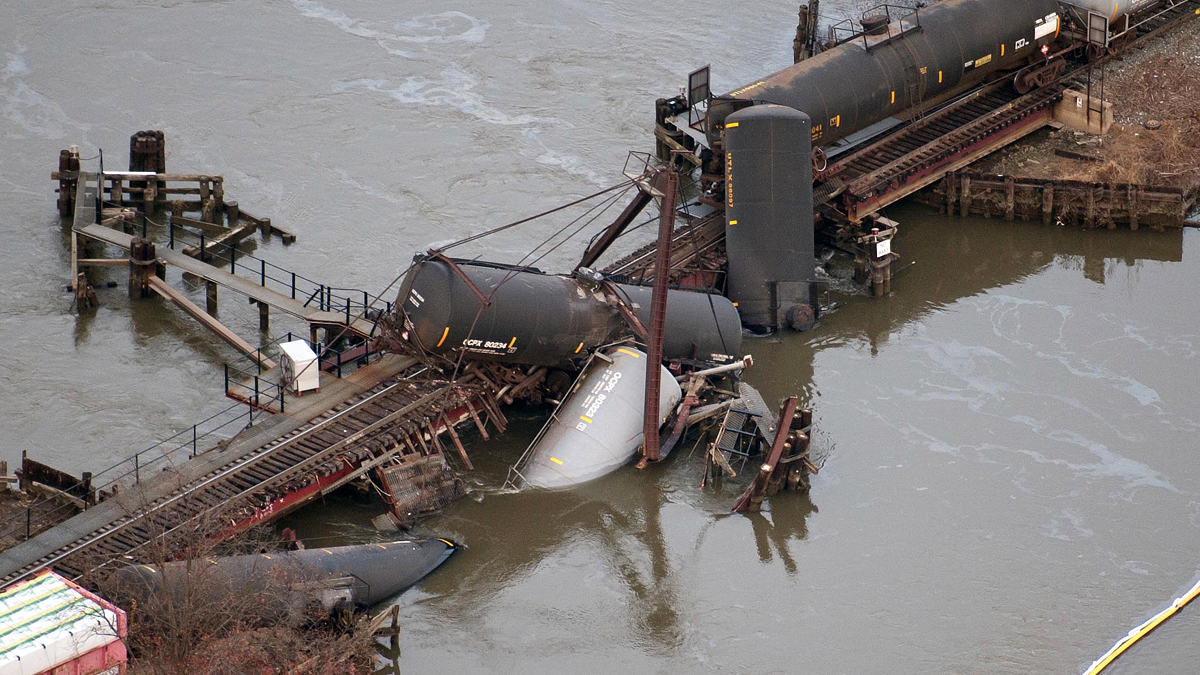 Derailed freight train cars lie in water in Paulsboro, N.J., in 2012. (AP Photo/Cliff Owen) 