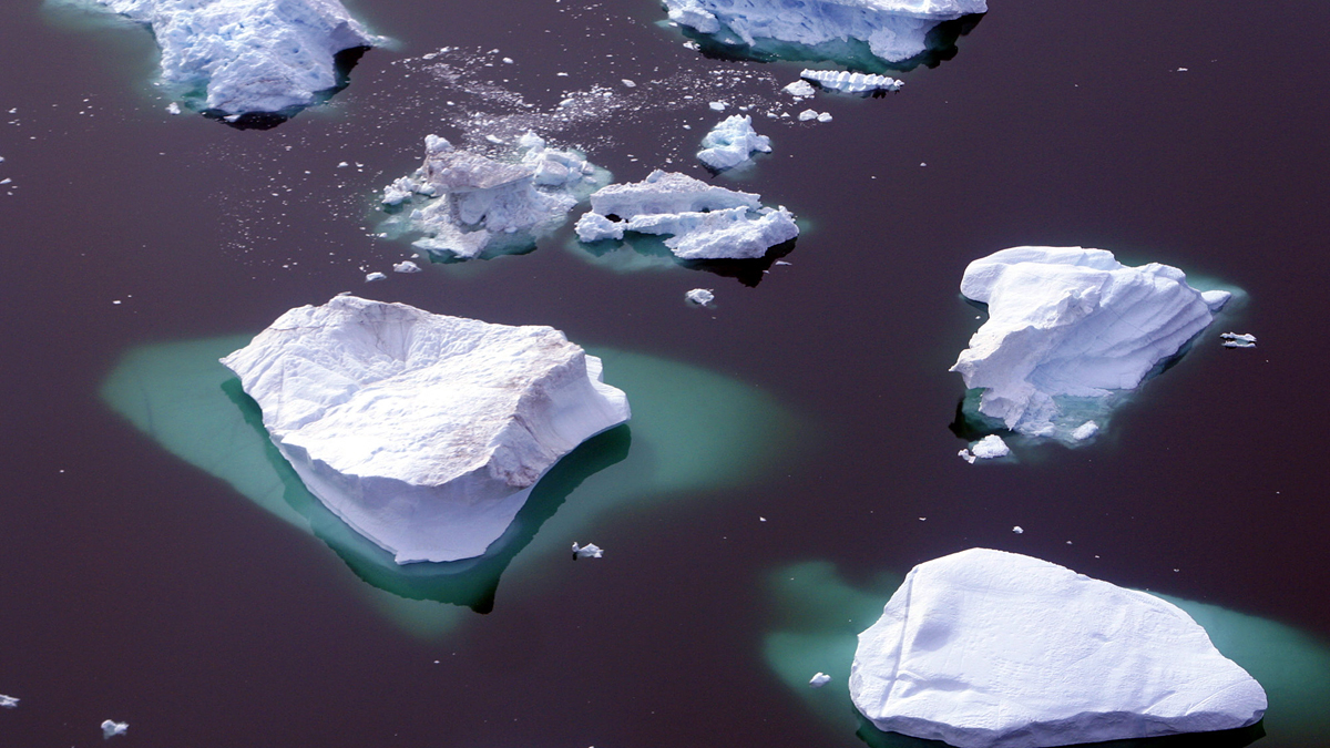 While travelling by helicopter and small aircraft, spectacular sweeping views of glaciers, icebergs and details of the Greenland ice cap can be seen over Greenland, Aug. 17, 2005. Scientists say the vast icy landscape is thinning, and many blame global warming. (AP Photo/John McConnico) 