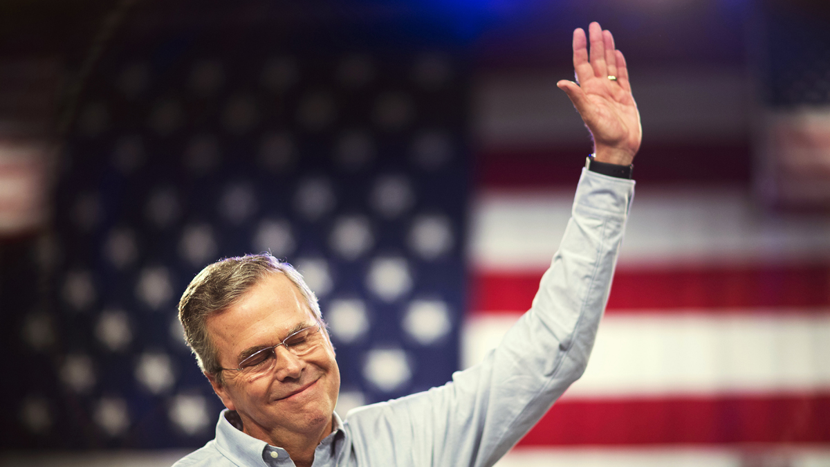 Former Florida Gov. Jeb Bush waves as he takes the stage to formally join the race for president, Monday, June 15, 2015, at Miami Dade College in Miami. (AP Photo/David Goldman) 