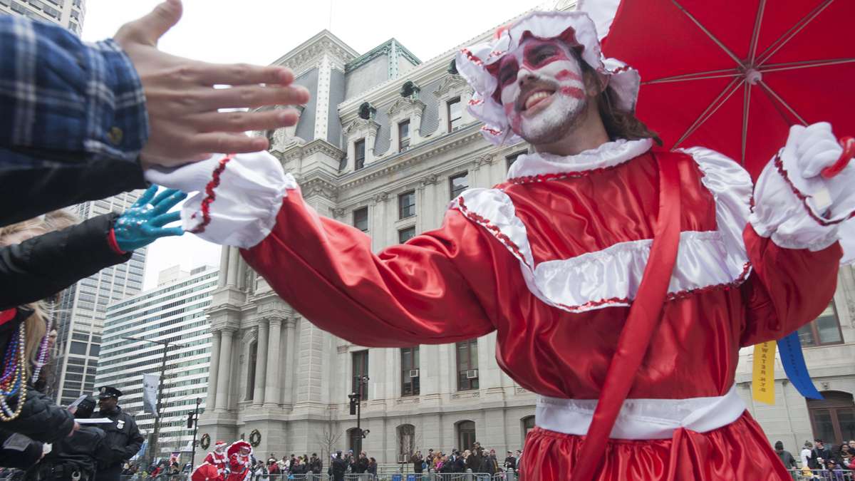 A member of the Fitzwater NYB shakes hands with spectators. (Jonathan Wilson/for NewsWorks)