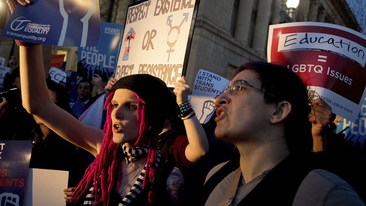  Activists and protesters with the National Center for Transgender Equality rally in front of the White House, Wednesday, Feb. 22, 2017, in Washington, after the Department of Education and the Justice Department announce plans to overturn the school guidance on protecting transgender students. (AP Photo/Andrew Harnik) 
