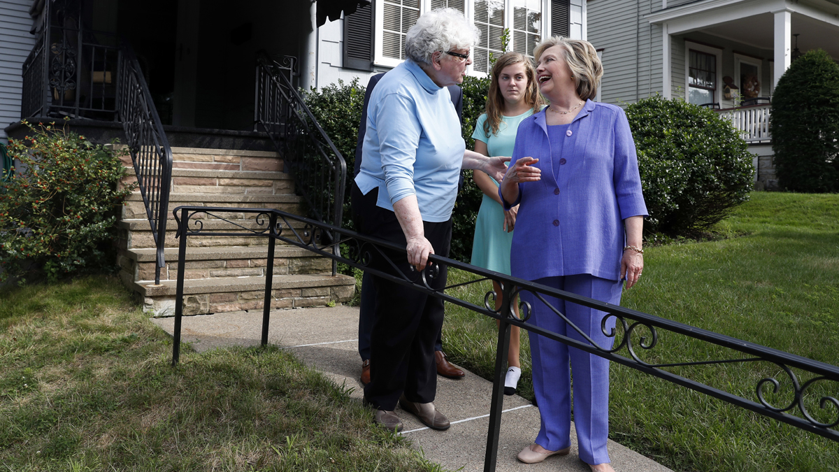  Democratic presidential candidate Hillary Clinton talks with Anne Kearns, left, as she campaigns in Scranton, Pa., Monday, Aug. 15, 2016. (AP Photo/Carolyn Kaster) 