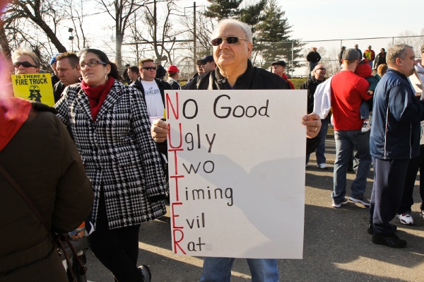 <p>Local 22 supporter Al Iavecchia showed his feeling for Mayor Nutter with this acrostic poem. (Kimberly Paynter/WHYY)</p>
