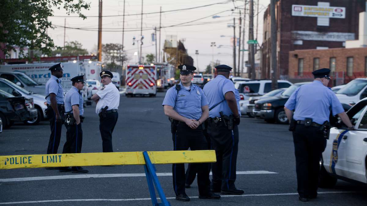Investigators at the scene of the derailed Amtrak train bound for Washington D.C. near Port Richmond in North Philadelphia on Wednesday morning.