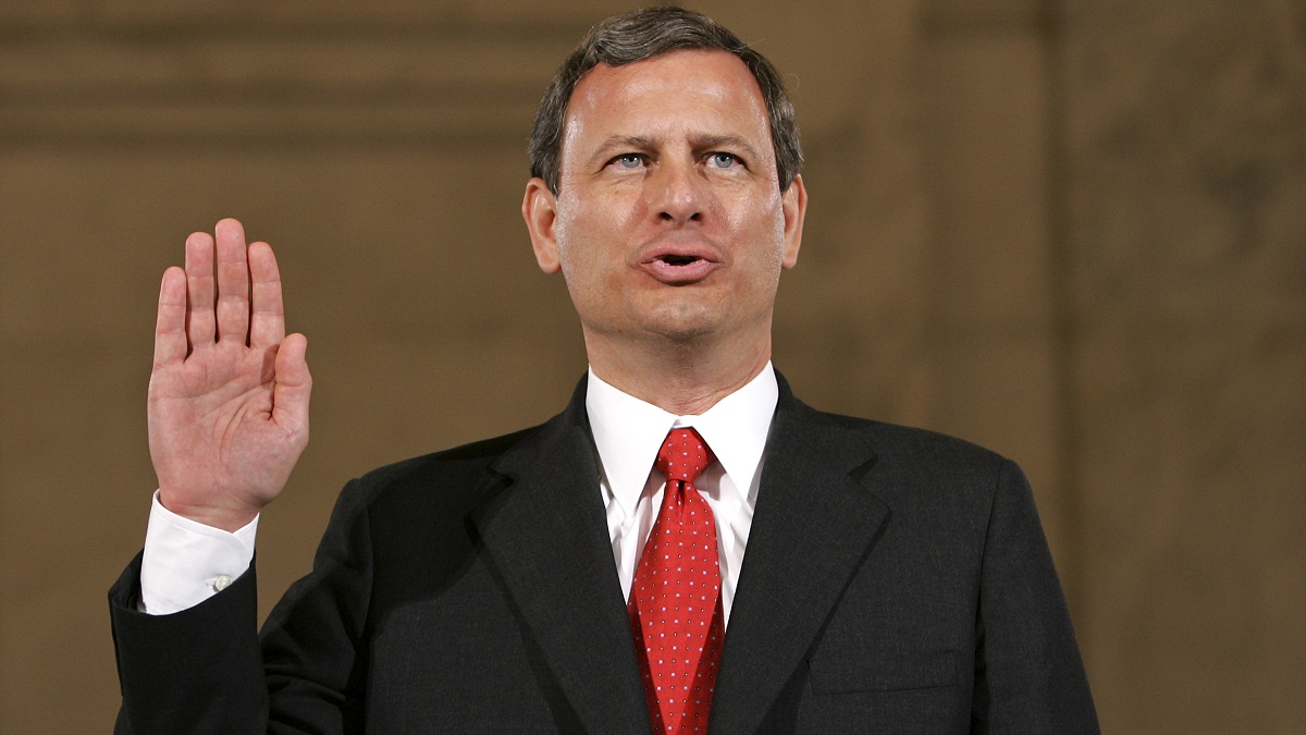  Judge John G. Roberts raises his right hand as he is sworn in before the Senate Judiciary Committee to testify on his confirmation to become the chief justice of the United States in 2005. (AP Photo/Pablo Martinez Monsivais)