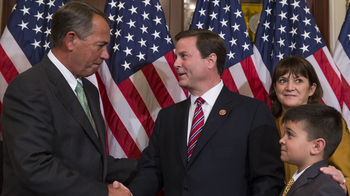  Speaker of the House Rep. John Boehner, R-Ohio, left, shakes hands with U.S. Rep. Donald Norcross, D-N.J., center, during a ceremonial swearing-in ceremony on Capitol Hill in November.  (AP Photo/Evan Vucci) 