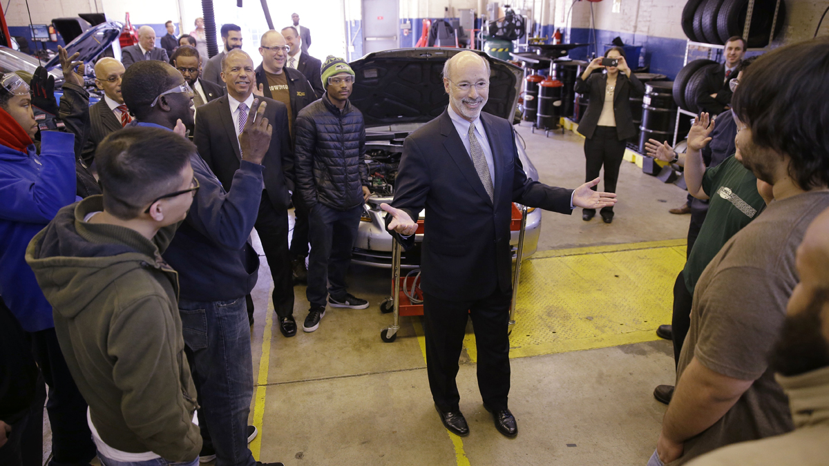  Gov. Tom Wolf visits Professor Dan Reed's automotive service technology class at the Community College of Philadelphia. The governor's budget talks with the Republican-controlled Legislature may stall before they start.(AP Photo/Matt Rourke) 