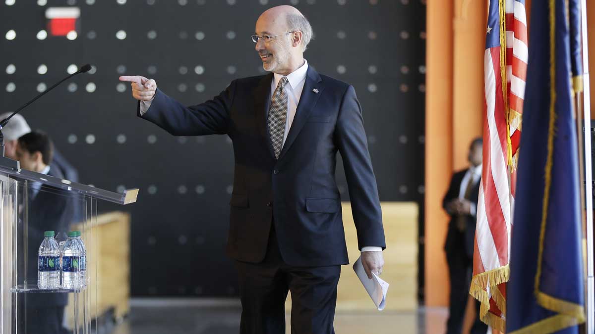  Gov. Tom Wolf walks to the podium to speak to a business group about his upcoming budget at the MusikFest Café in Bethlehem, Pennsylvania. Wolf will seek to cut the commonwealth's major corporate income tax rate in half, but also try to broaden how it is applied. (AP Photo/Matt Rourke) 
