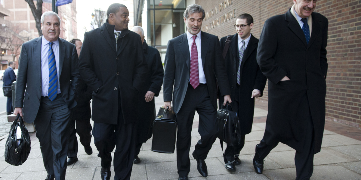  Attorney Chris Seeger (center) says some younger players eligible for part of the $1 billion settlement with the NFL believe they don't need help —  although it may take years for the illnesses covered in the payouts to emerge. (AP file photo)  