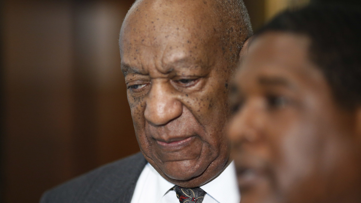 Comedian Bill Cosby leaves the Montgomery County Courthouse after being ordered to stand trail for assault charges