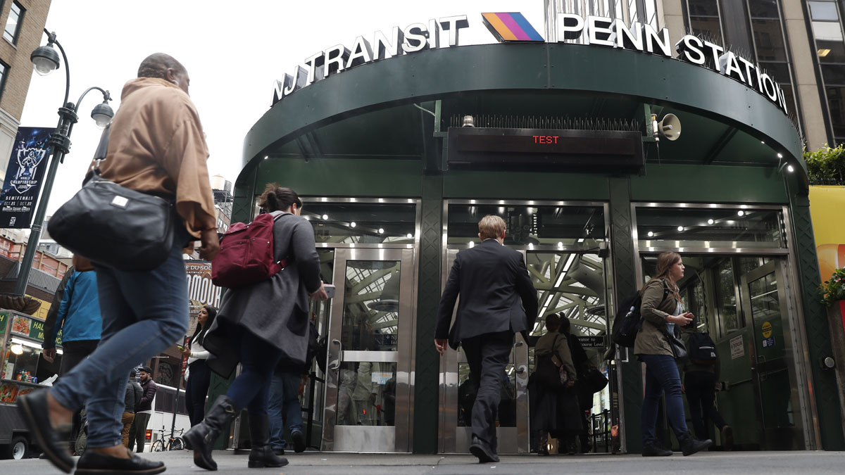  In this Sept. 29, 2016, file photo, commuters enter Penn Station in New York City. (AP Photo/Mary Altaffer) 