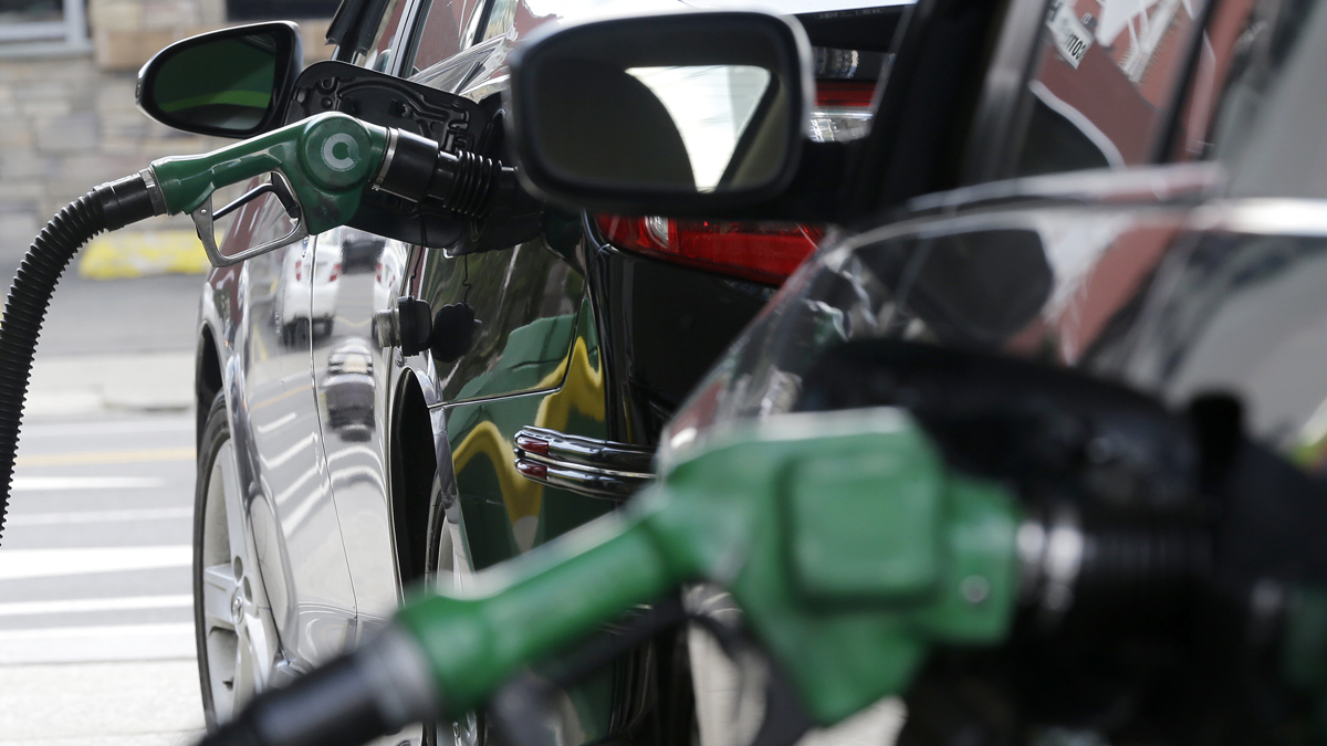Nozzles pump gas into vehicles at a BP gas station in Hoboken