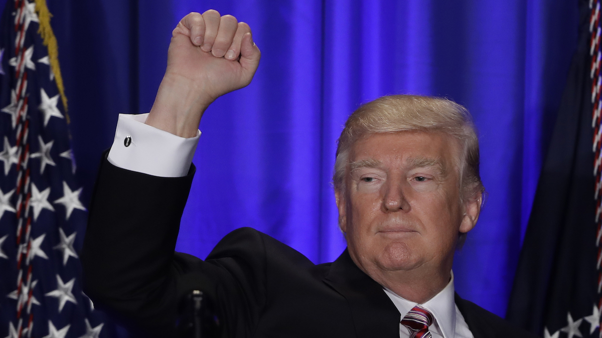 President Donald Trump gestures while speaking at the Republican congressional retreat in Philadelphia