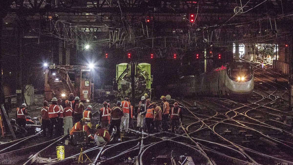  Workers repair rails inside New York's Penn Station. Accelerated repair work in the wake of recent breakdowns at New York’s Penn Station will begin in May and cause delays this summer for rail travelers who already have endured major disruptions recently, Amtrak officials said Thursday. (Chuck Gomez/Amtrak via AP, file) 