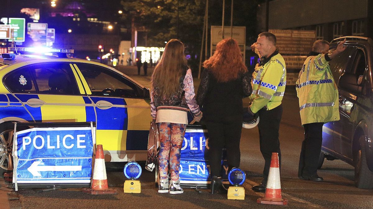  Police work at Manchester Arena after reports of an explosion at the venue during an Ariana Grande gig in Manchester, England Monday, May 22, 2017. Several people have died following reports of an explosion Monday night at an Ariana Grande concert in northern England, police said. A representative said the singer was not injured. (Peter Byrne/PA via AP) 