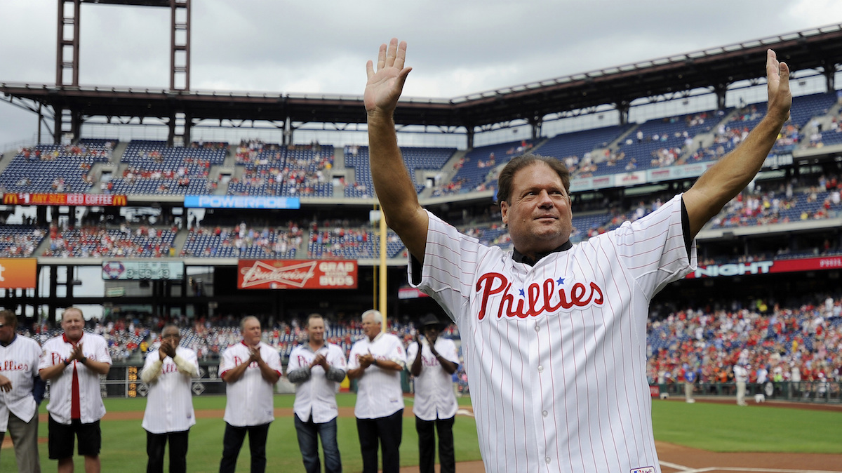  In this Aug 3, 2013, file photo, former Philadelphia Phillies catcher Darren Daulton waves to the crowd as he takes the field during the Philadelphia Phillies Alumni ceremonies before a baseball game against the Atlanta Braves in Philadelphia. Daulton, the All-Star catcher who was the leader of the Phillies' NL championship team in 1993, has died. He was 55. (AP Photo/Michael Perez, File) 