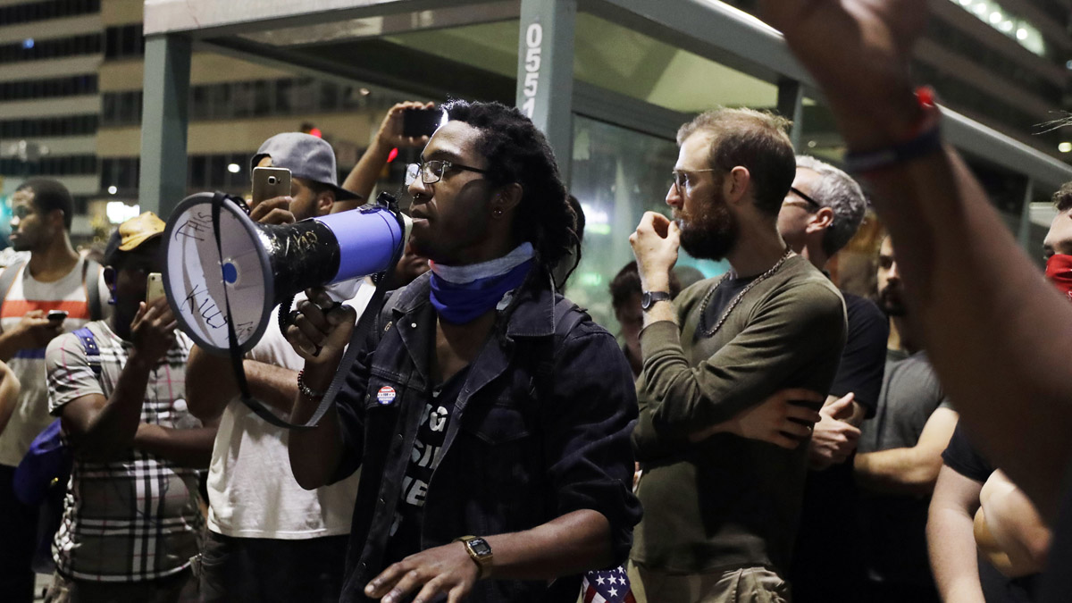  Protesters call for removing the statue of the late Philadelphia Mayor Frank Rizzo, who also served as the city's police commissioner, outside the Municipal Services Building in Philadelphia. (AP Photo/Matt Slocum) 