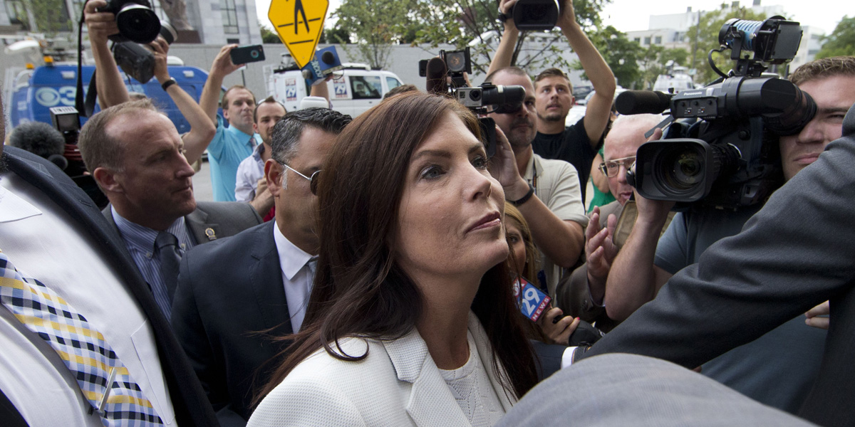 Pennsylvania Attorney General Kathleen Kane arrives to be processed and arraigned on charges she leaked secret grand jury material and then lied about it under oath on Saturday at the Montgomery County detective bureau in Norristown.
(AP Photo/Matt Rourke)