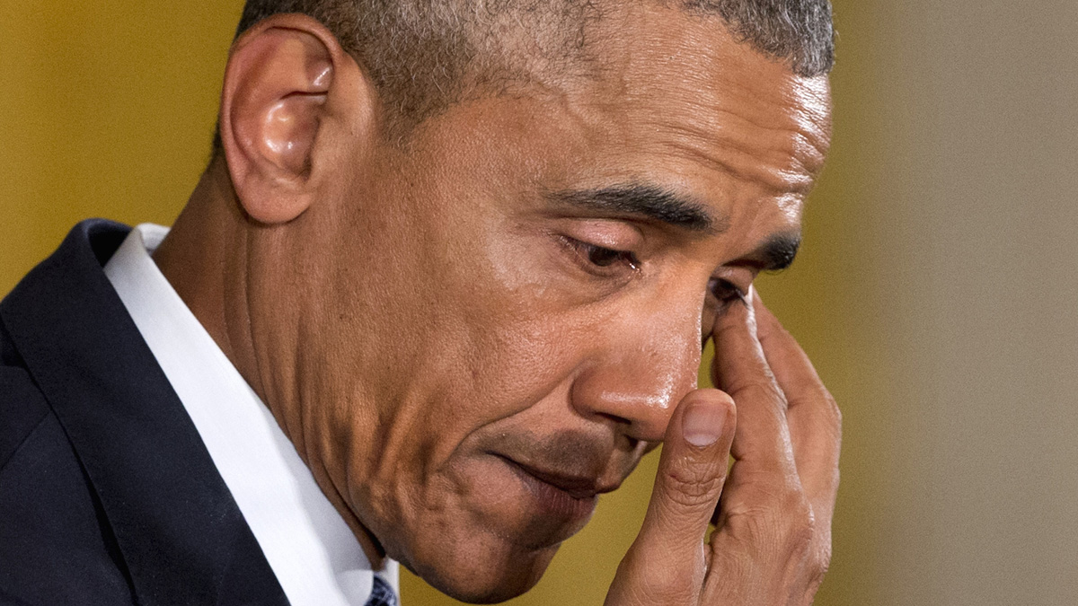  An emotional President Barack Obama pauses to wipe away tears as he recalled the 20 first-graders killed in 2012 at Sandy Hook Elementary School, while speaking in the East Room of the White House in Washington, Tuesday about steps his administration is taking to reduce gun violence. (AP Photo/Jacquelyn Martin 