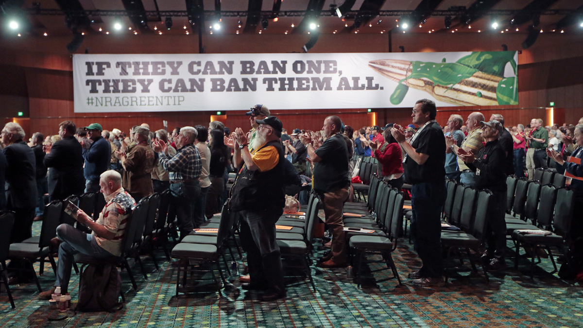 National Rifle Association members applaud a speech during the annual meeting of members at the NRA convention in April in Nashville, Tennessee. (AP file photo) 