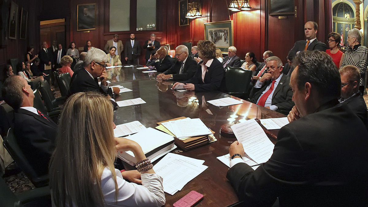  Pennsylvania senators gather to discuss pension legislation in the Rules Committee ahead of floor debate at the state Capitol in Harrisburg last week. Democratic Gov. Tom Wolf rejected the GOP's overhaul plan Thursday. (AP Photo/Chris Knight) 