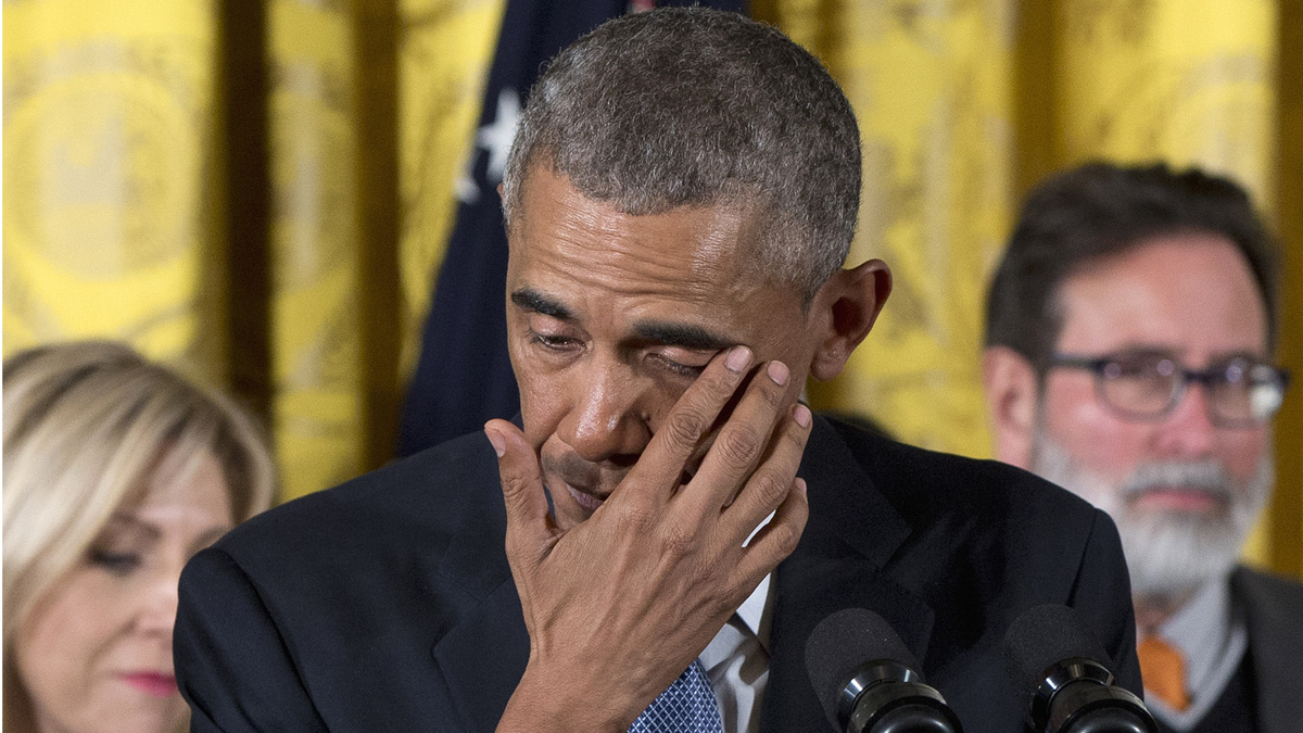 President Barack Obama wipes away tears from his eyes as he recalled the 20 first-graders killed in 2012 at Sandy Hook Elementary School