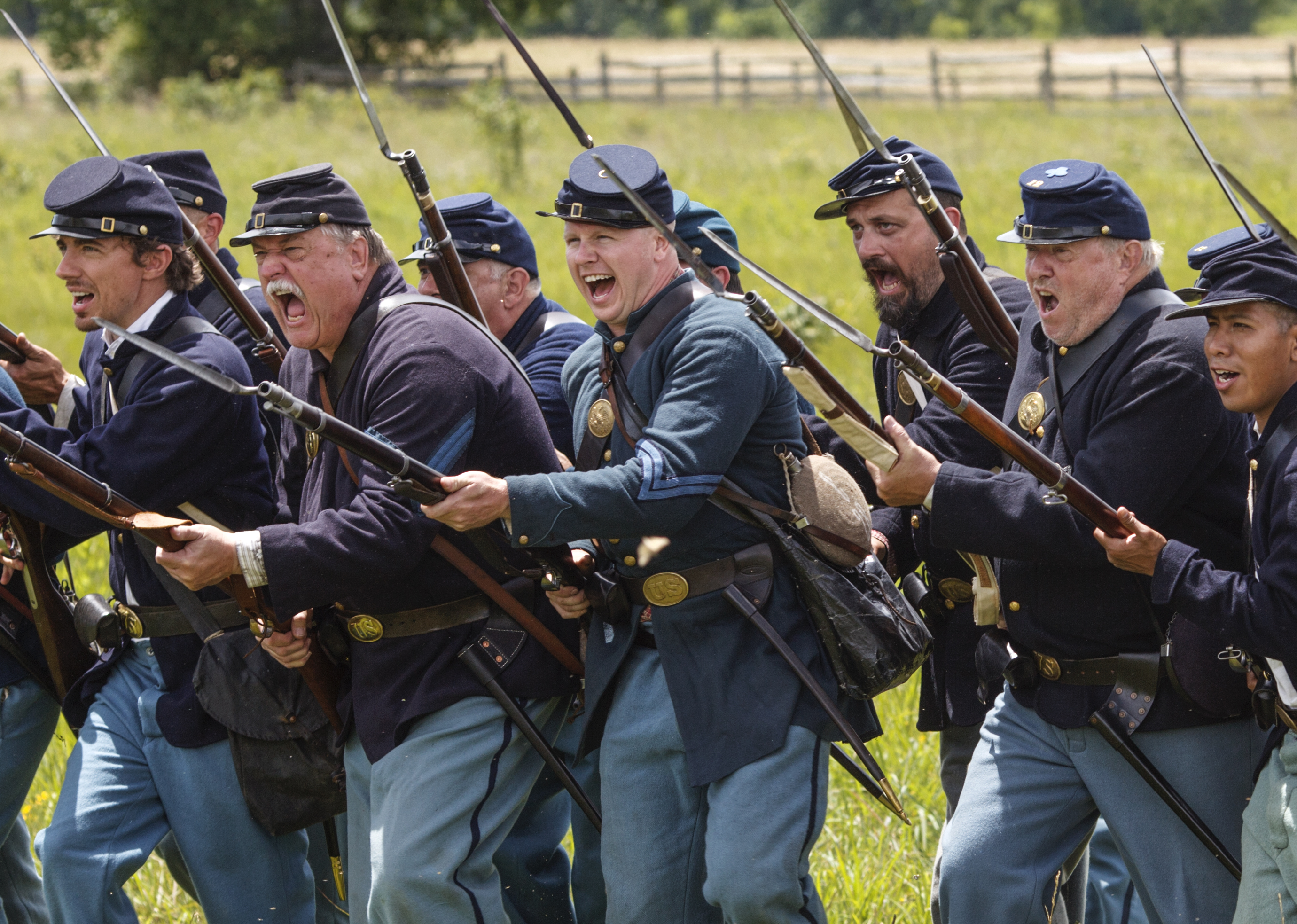  The Mifflin Guard Infantry, volunteer Civil War reenactors, portray Federal soldiers at the battle of Gettysburg on the 153 anniversary of Civil War conflict, at the Gettysburg National Military Park in Pennsylvania, Saturday, July 2, 2016. (AP Photo/J. Scott Applewhite) 